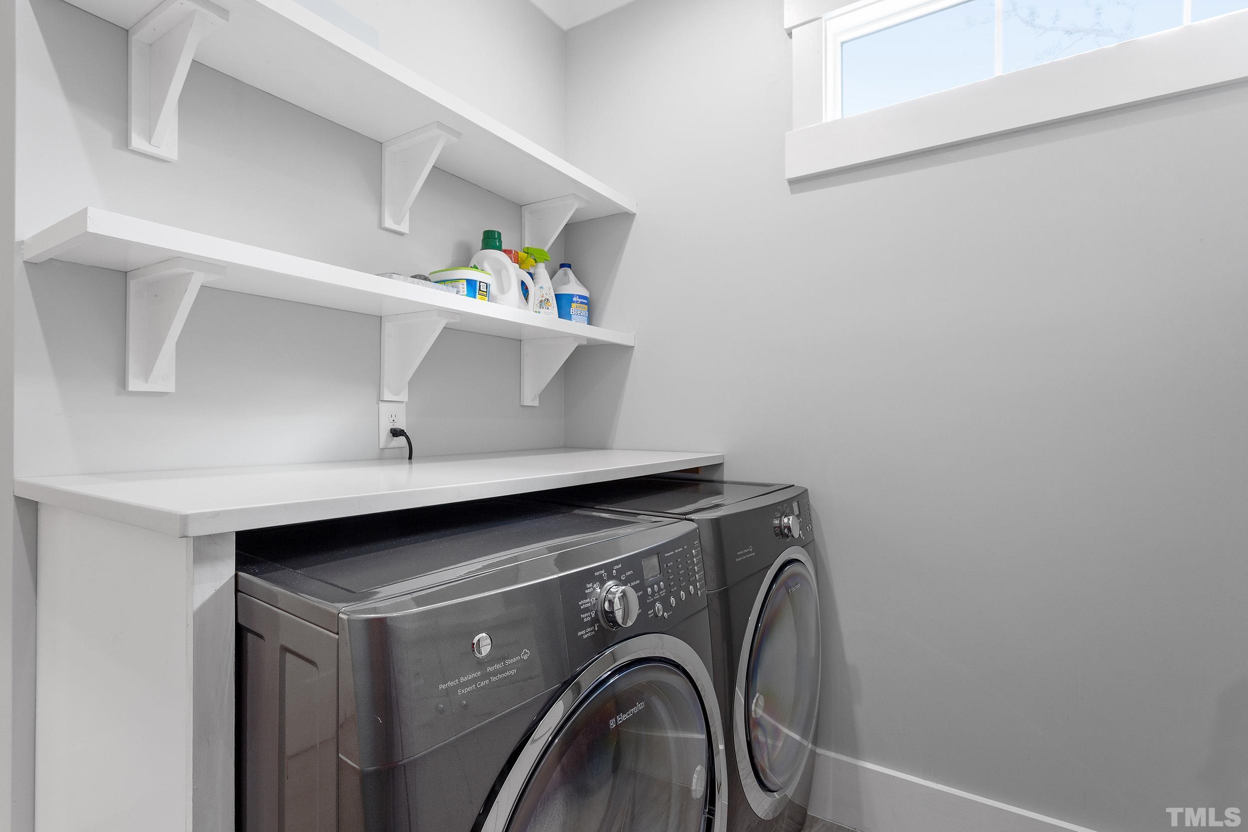 2511 Beechridge Road Raleigh, NC 27608 - Photo 41 of 45 a utility room with dryer and washer