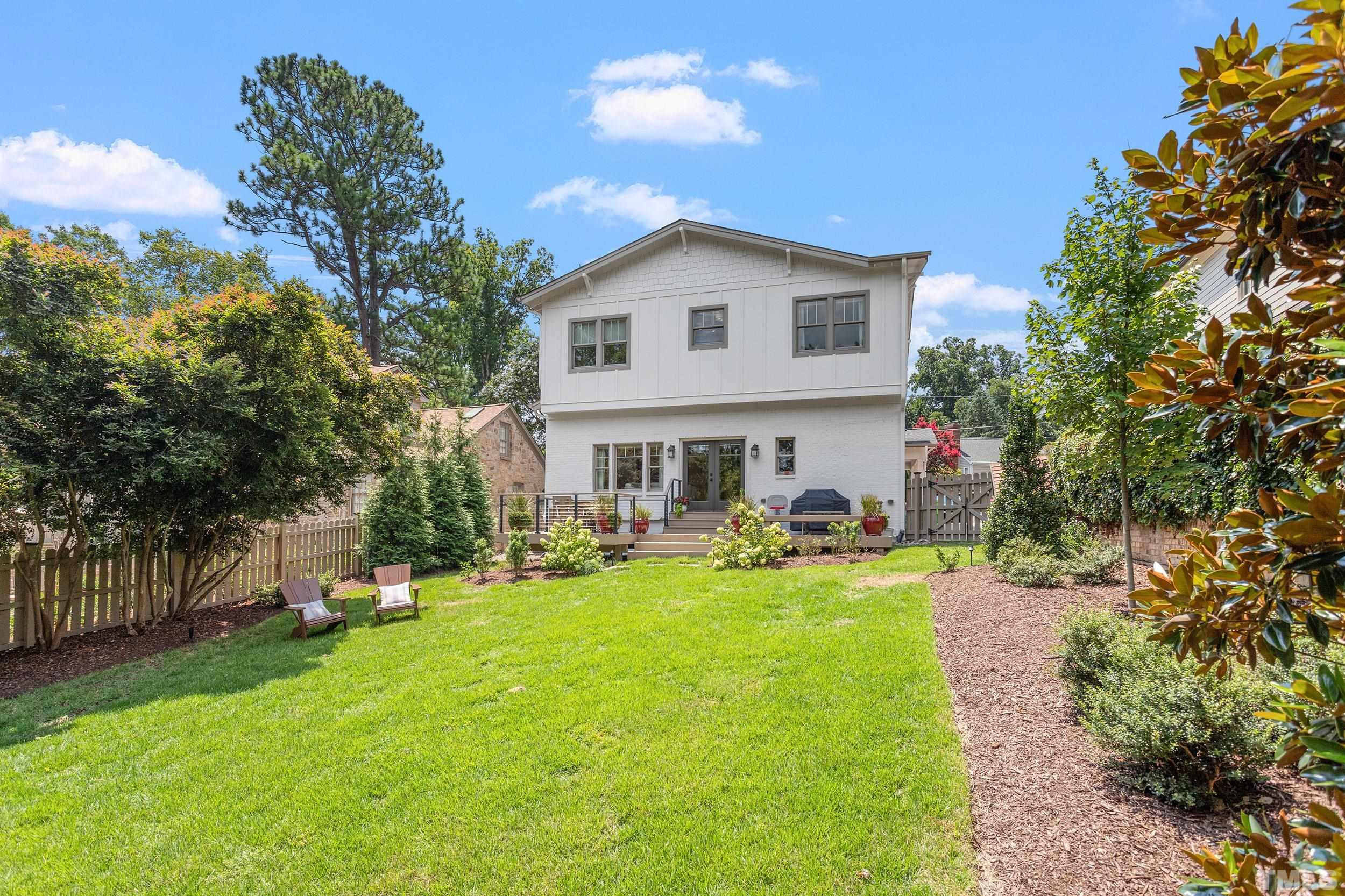 2511 Beechridge Road Raleigh, NC 27608 - Photo 45 of 45 a view of a house with backyard and sitting area