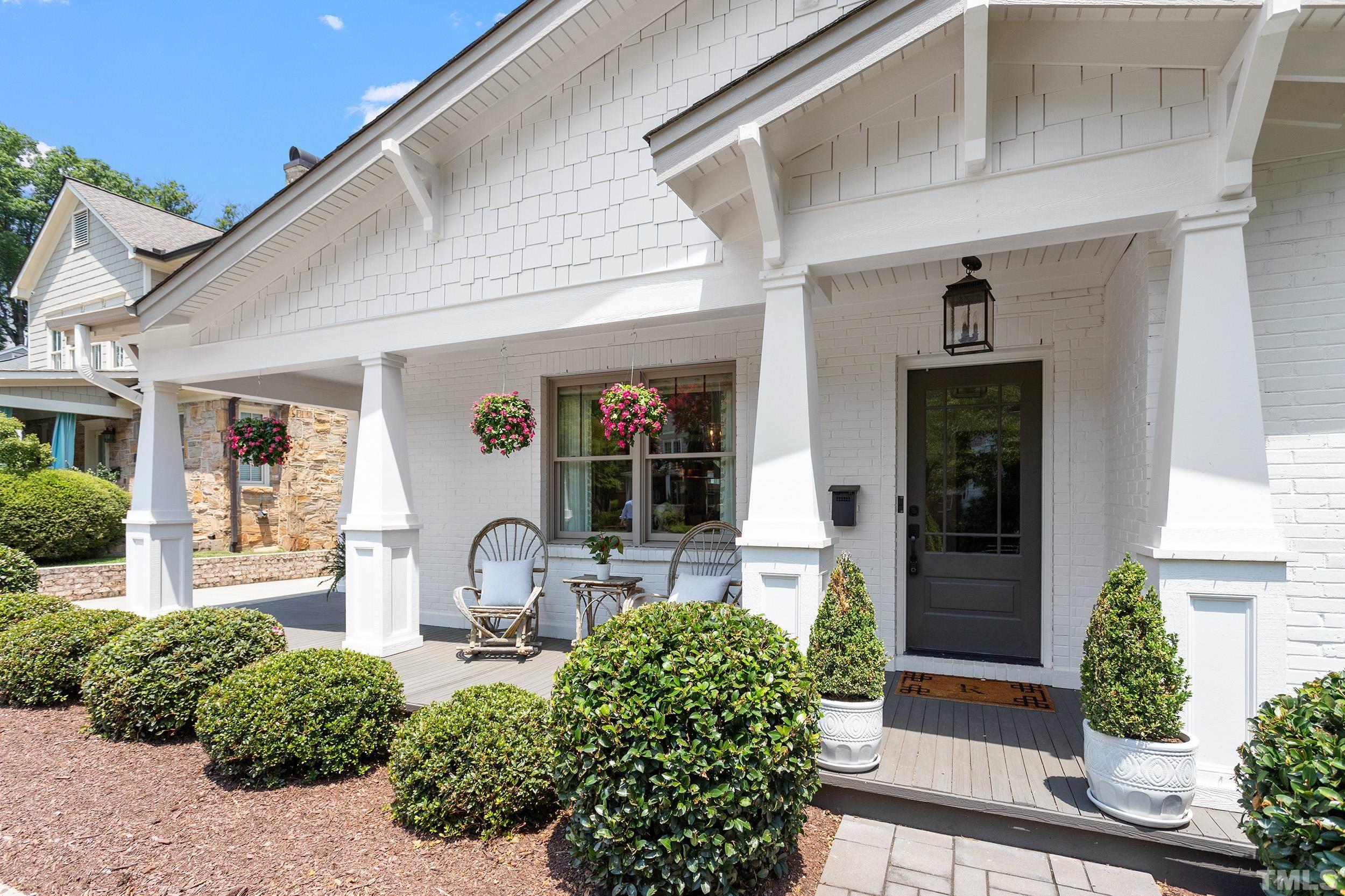 2511 Beechridge Road Raleigh, NC 27608 - Photo 5 of 45 a front view of a house with garden