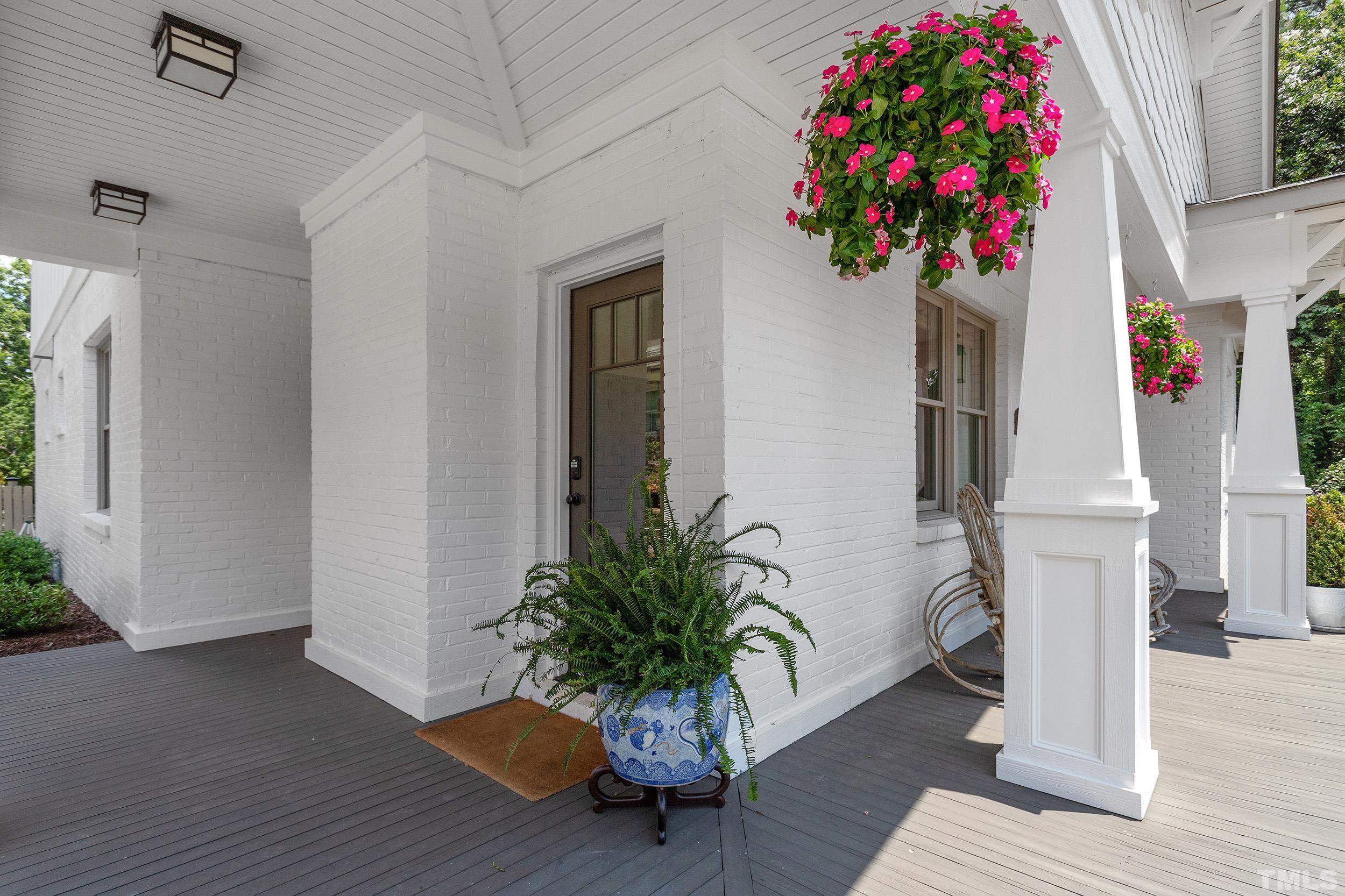 2511 Beechridge Road Raleigh, NC 27608 - Photo 6 of 45 a flower pot with wooden floor