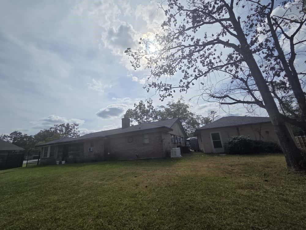 252 Parkside Loop Brookeland, TX 75931 - Photo 20 of 22 a view of house with outdoor space and garden