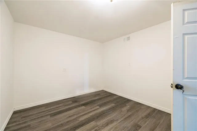 a view of small space with wooden floor