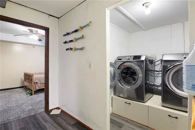 a utility room with dryer and washer