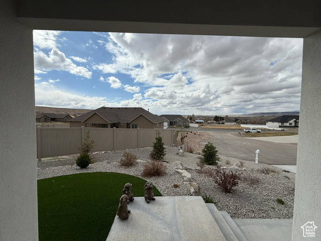 1240 West 2360 North Helper, UT 84526 - Photo 75 of 79 View of yard with a residential view and fence