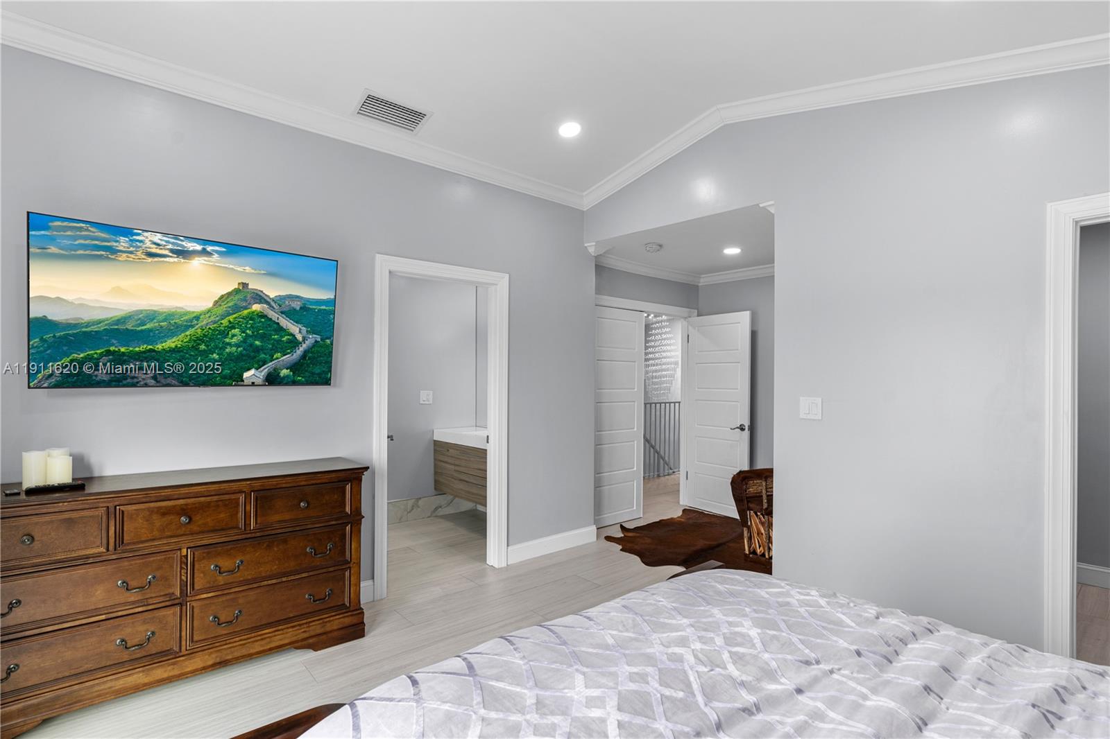 5262 Southwest 153rd Court Miami, FL 33185 - Photo 20 of 47 a bedroom with a bed and a television