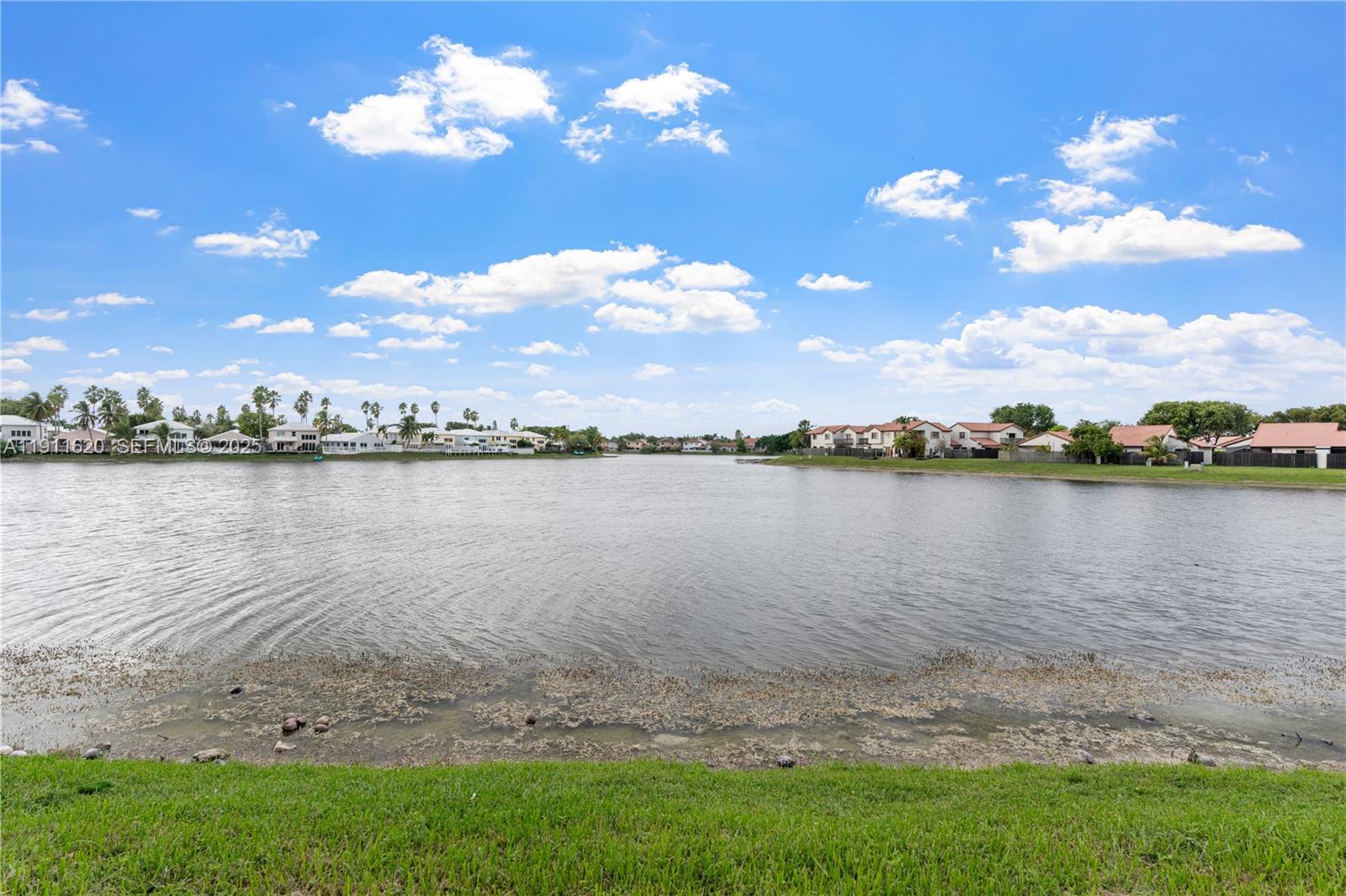 5262 Southwest 153rd Court Miami, FL 33185 - Photo 35 of 47 a view of a lake with a city
