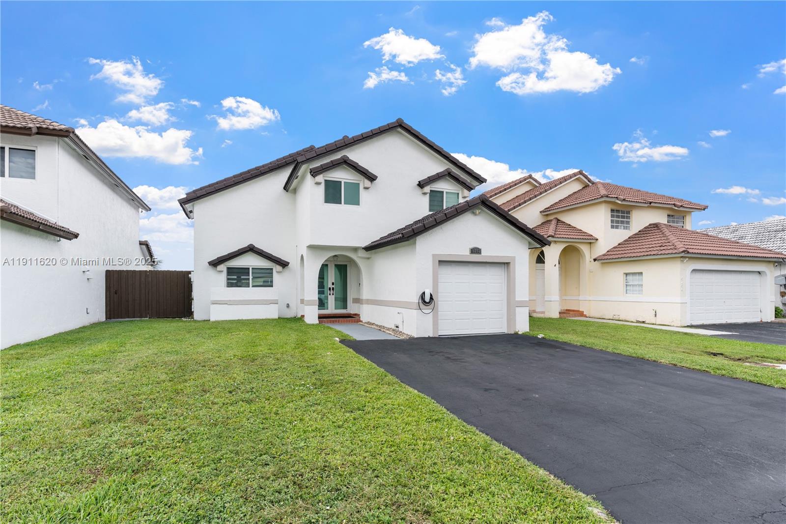 5262 Southwest 153rd Court Miami, FL 33185 - Photo 39 of 47 a view of a house with a yard and a yard