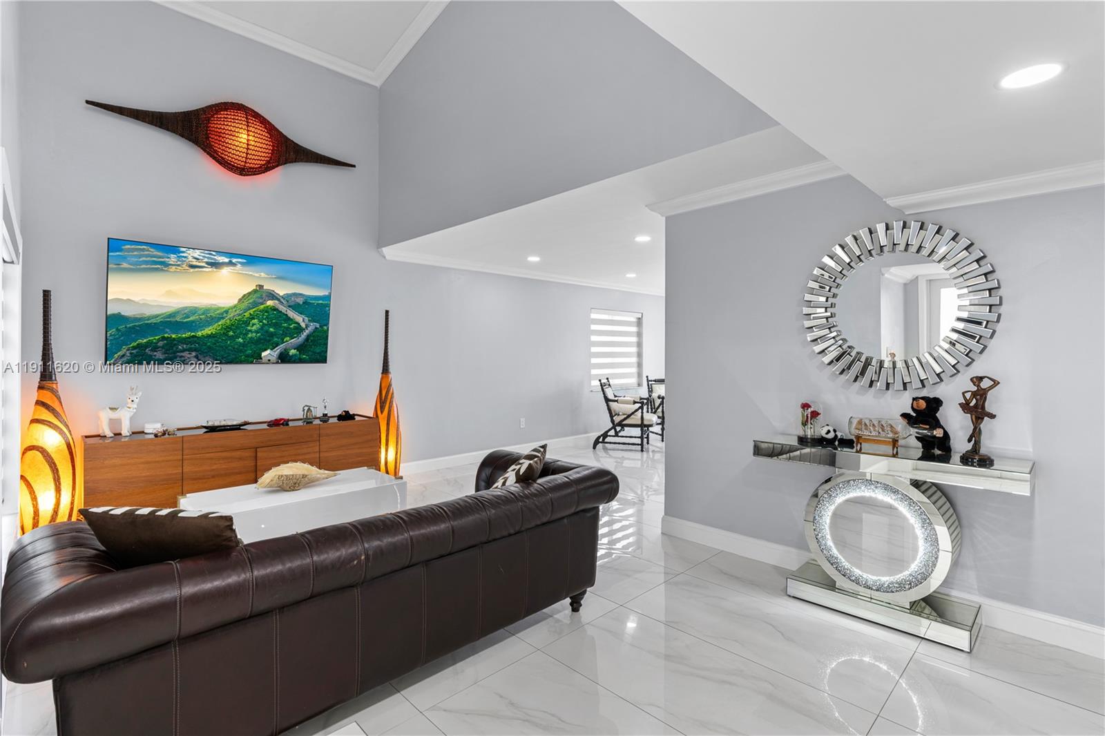 5262 Southwest 153rd Court Miami, FL 33185 - Photo 4 of 47 a living room with furniture and a flat screen tv