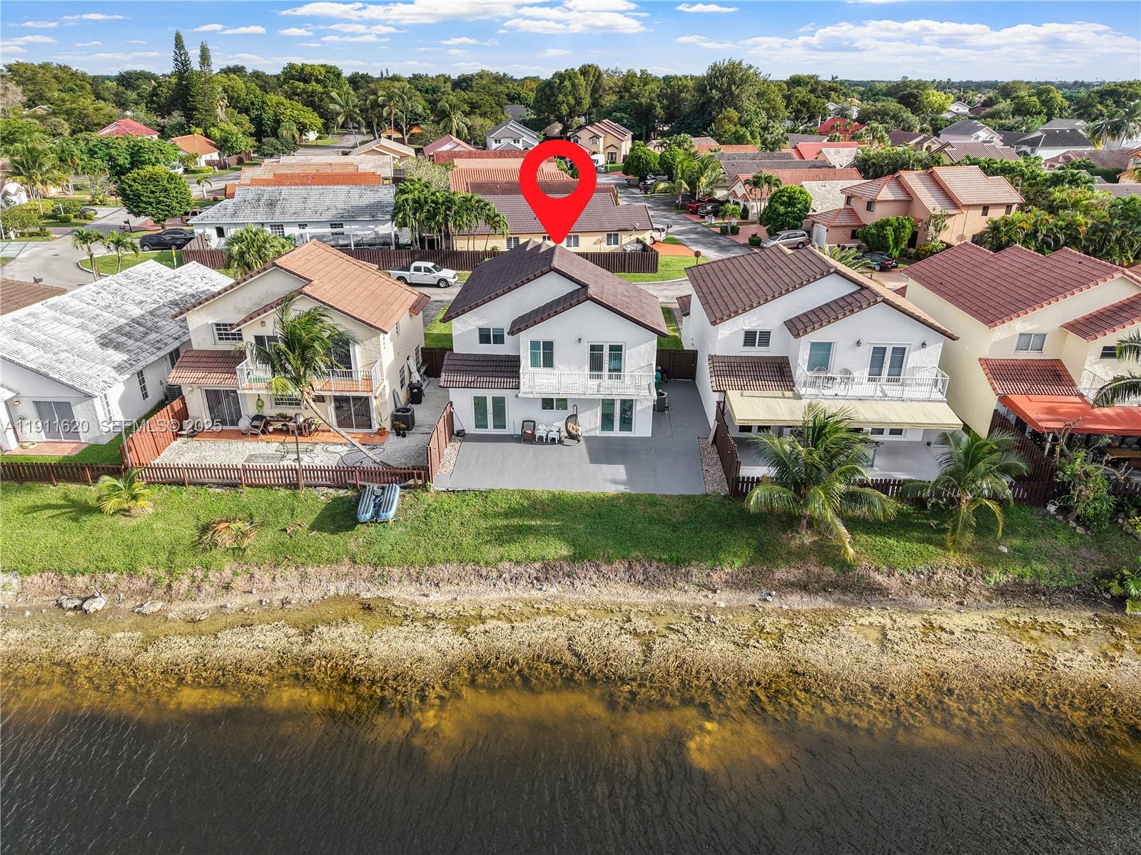 5262 Southwest 153rd Court Miami, FL 33185 - Photo 41 of 47 a aerial view of a house with a yard