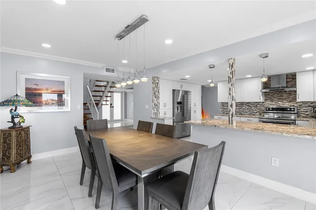 a view of a dining area with furniture