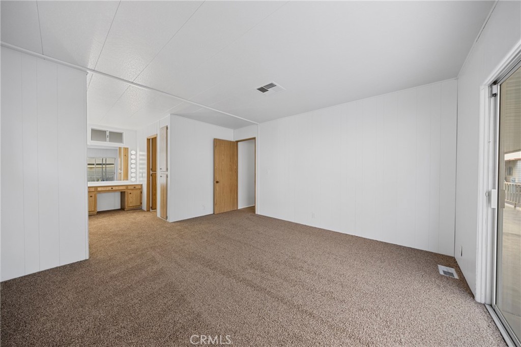 950 California Street, Unit 82 Calimesa, CA 92320 - Photo 14 of 49 a view of an empty room with a window