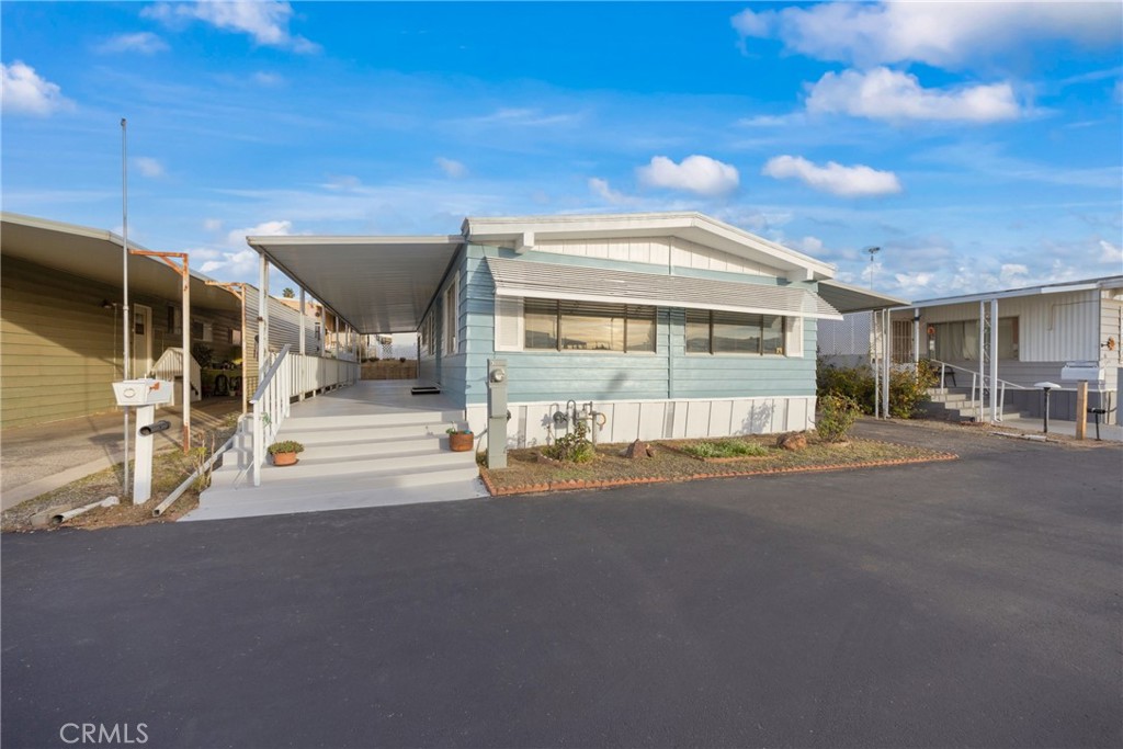 950 California Street, Unit 82 Calimesa, CA 92320 - Photo 2 of 49 a view of a building with a street