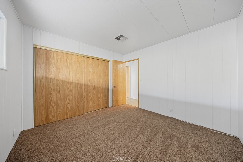 950 California Street, Unit 82 Calimesa, CA 92320 - Photo 22 of 49 a view of an empty room with a window