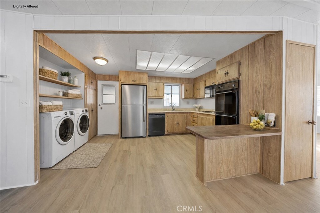 950 California Street, Unit 82 Calimesa, CA 92320 - Photo 3 of 49 a kitchen with refrigerator sink and stove top oven
