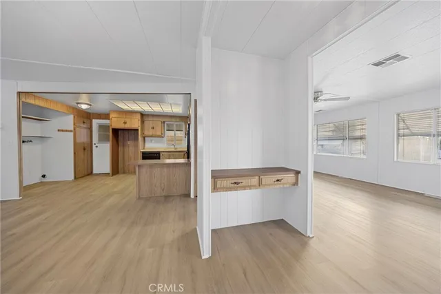 a view of an empty room and window