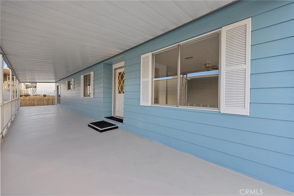 950 California Street, Unit 82 Calimesa, CA 92320 - Photo 35 of 49 a view of an entryway with wooden floor