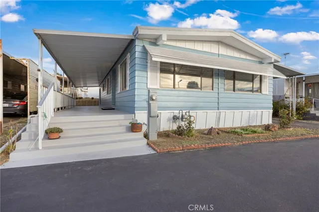 a view of a house with sitting area