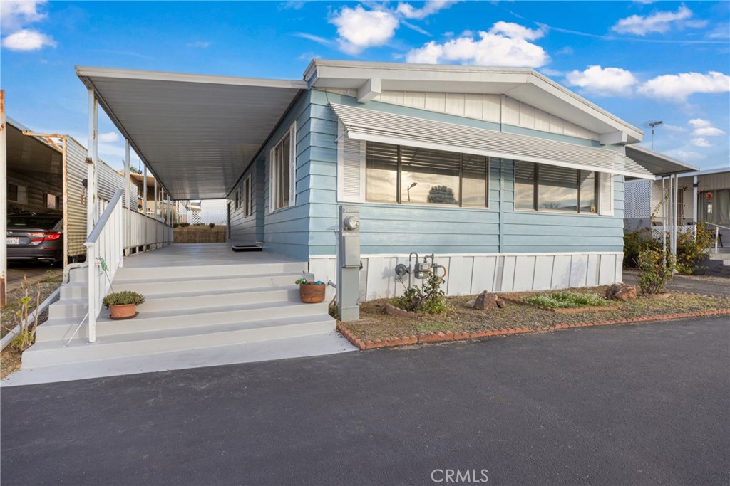 950 California Street, Unit 82 Calimesa, CA 92320 - Photo 37 of 49 a view of a house with a street