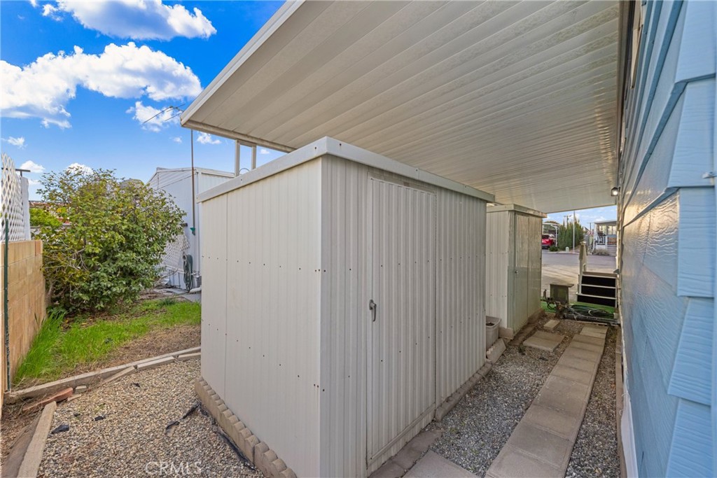 950 California Street, Unit 82 Calimesa, CA 92320 - Photo 43 of 49 a view of a house with a backyard