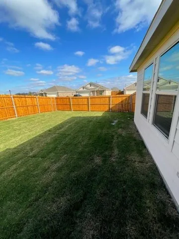 a view of an outdoor space and a yard