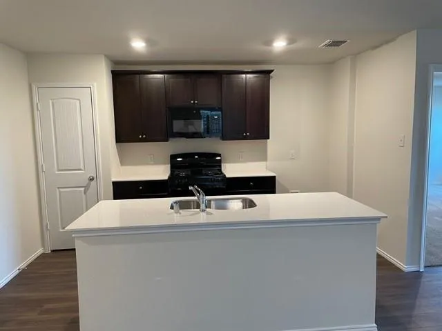 a view of kitchen with stainless steel appliances