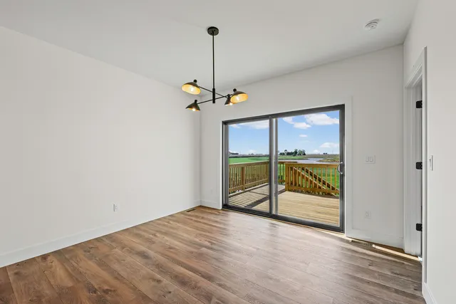 a view of an empty room and window