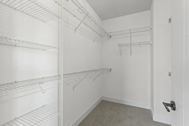 a view of a room with racks on the wall