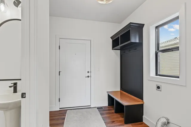 a room with furniture and a window