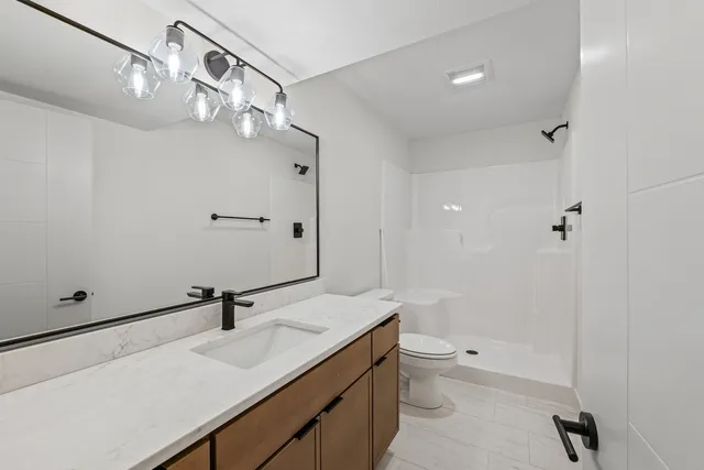 a view of a room with wooden walls