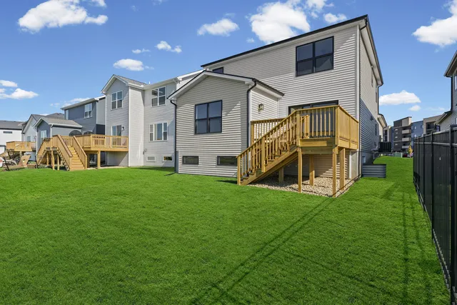 a view of a two chairs on the roof deck