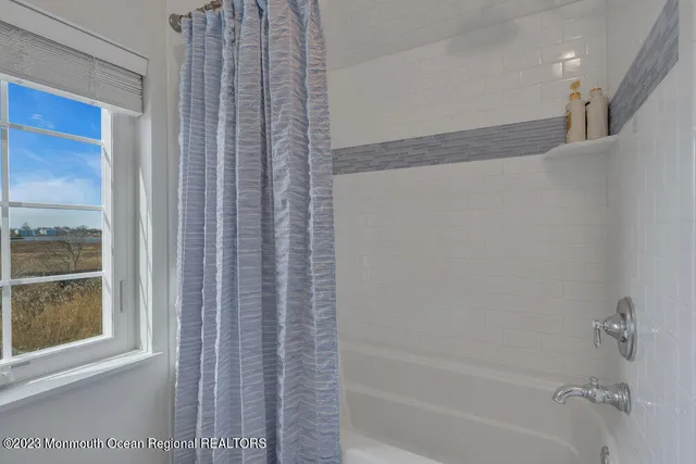 a bathroom with a bathtub