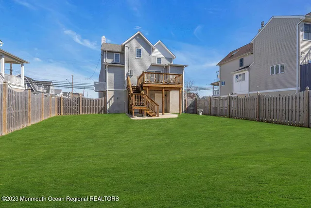 a view of a front of a house with a yard