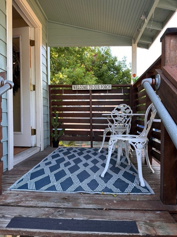 208 West 10th Street, Unit 201 Georgetown, TX 78626 - Photo 12 of 18 a view of a balcony with chairs