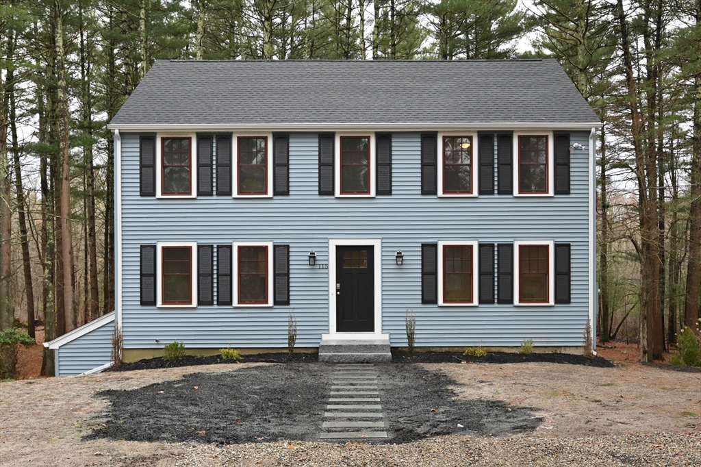 115 Brook Bend Road Hanover, MA 02339 - Photo 2 of 42 a house that has a window in front of it