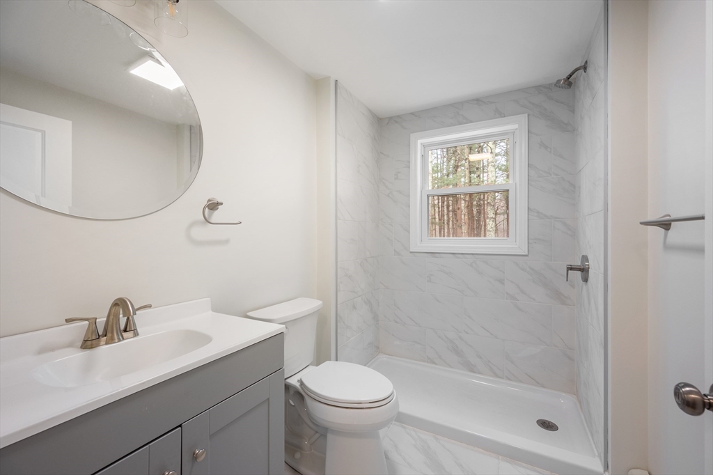 115 Brook Bend Road Hanover, MA 02339 - Photo 22 of 42 a bathroom with a sink toilet and shower