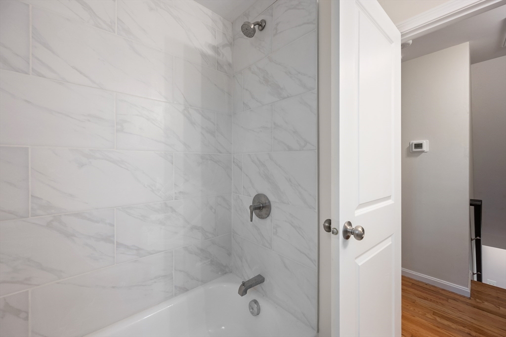 115 Brook Bend Road Hanover, MA 02339 - Photo 27 of 42 a bathroom with a bathtub