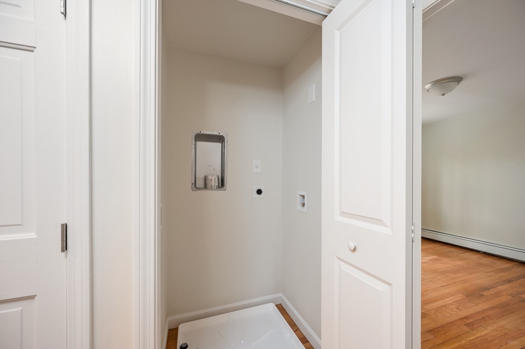 115 Brook Bend Road Hanover, MA 02339 - Photo 33 of 42 a view of a hallway with wooden floor