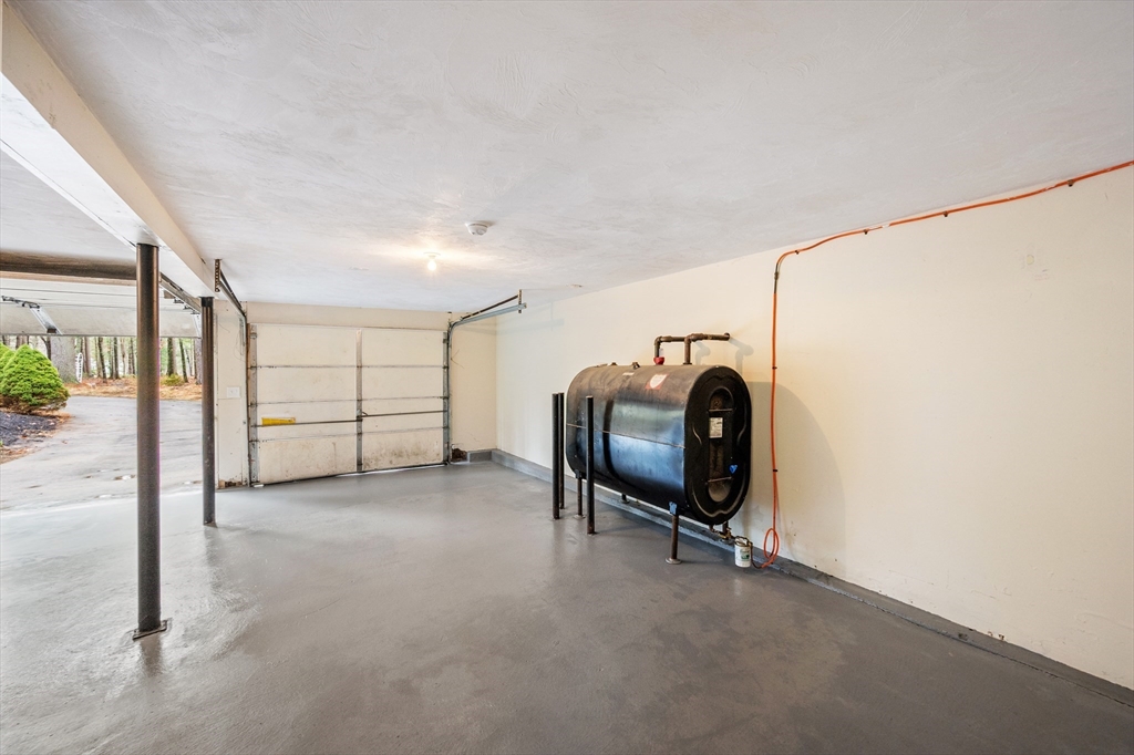 115 Brook Bend Road Hanover, MA 02339 - Photo 36 of 42 a view of a livingroom with furniture and a window