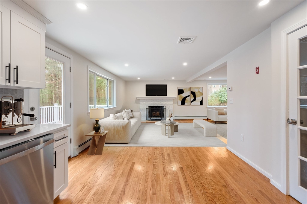 115 Brook Bend Road Hanover, MA 02339 - Photo 7 of 42 a very nice looking living room with a couch and a flat screen tv