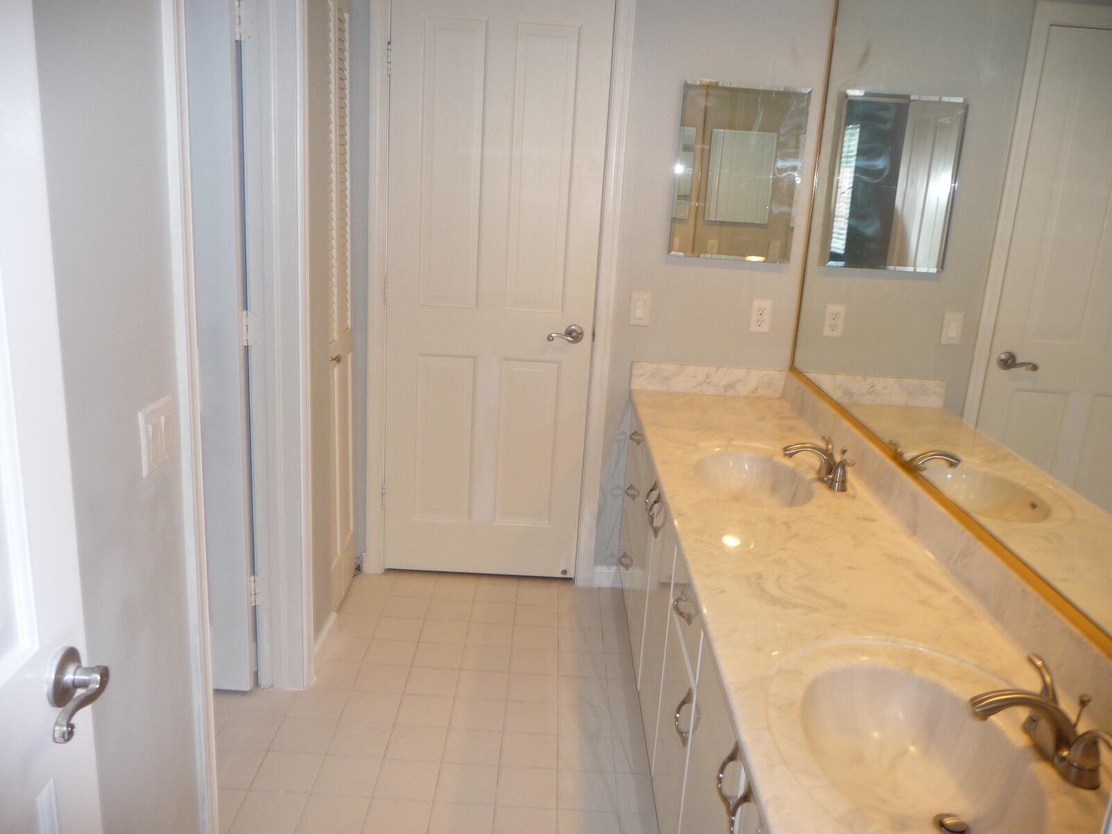 20694 Northwest 27th Avenue Boca Raton, FL 33434 - Photo 20 of 22 a spacious bathroom with a tub and shower