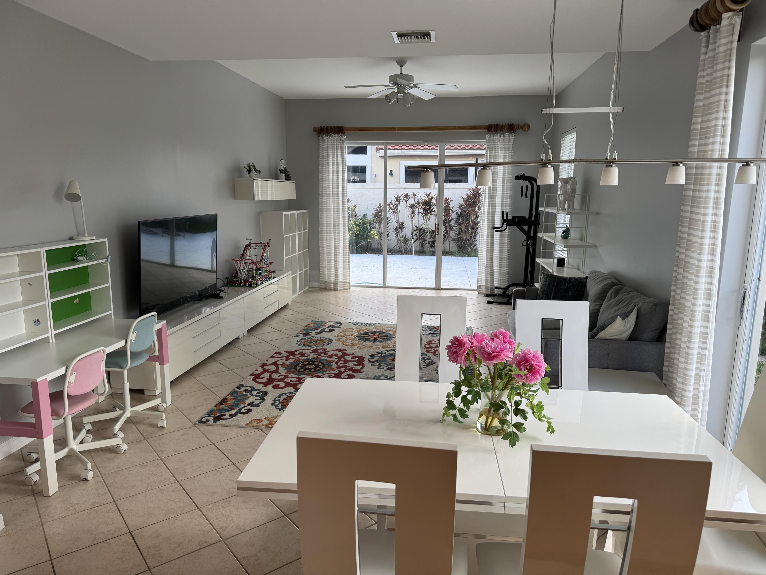 20694 Northwest 27th Avenue Boca Raton, FL 33434 - Photo 5 of 22 a kitchen with furniture and a potted plant