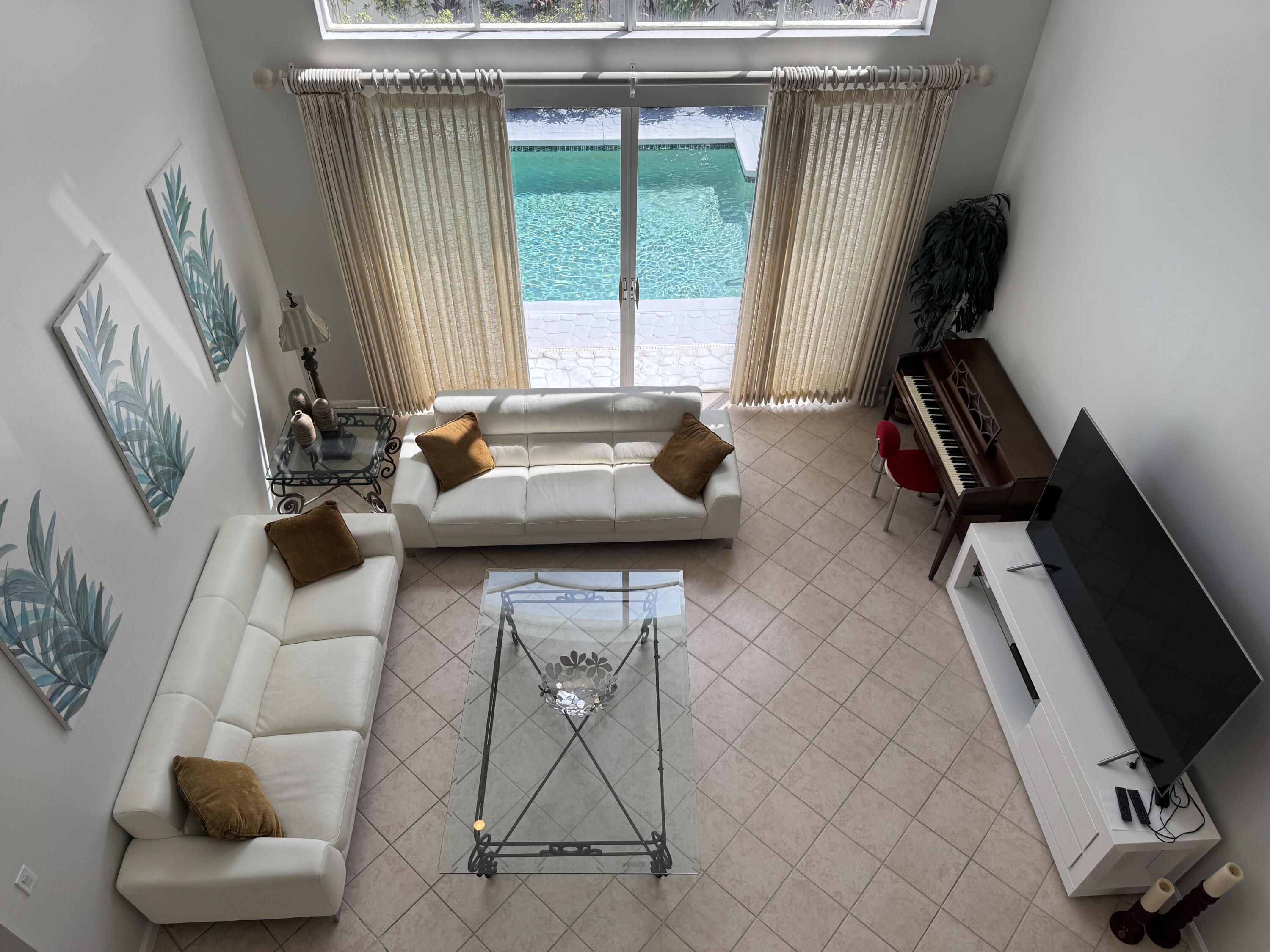 20694 Northwest 27th Avenue Boca Raton, FL 33434 - Photo 9 of 22 a bathroom with a sink and a mirror