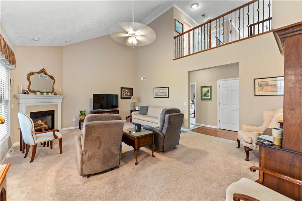 193 Lentz Road Latrobe, PA 15650 - Photo 12 of 45 a living room with furniture a dining table and a piano