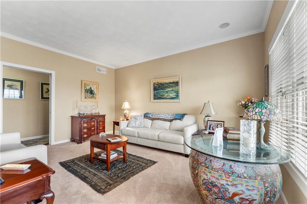 193 Lentz Road Latrobe, PA 15650 - Photo 15 of 45 a living room with furniture and a potted plant