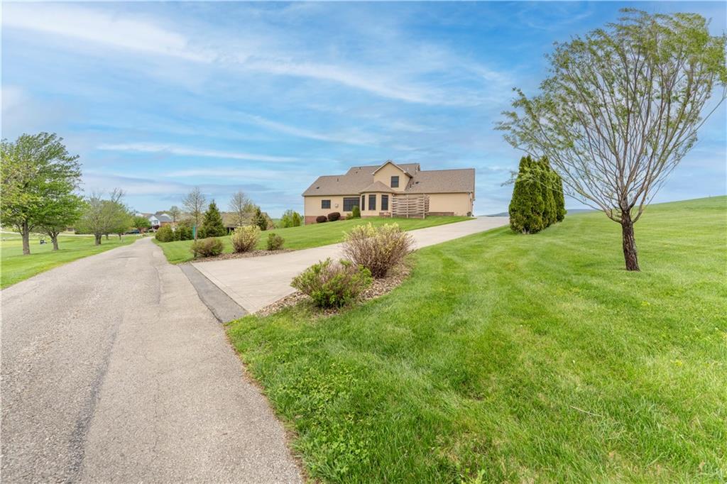 193 Lentz Road Latrobe, PA 15650 - Photo 3 of 45 a front view of a house with a yard