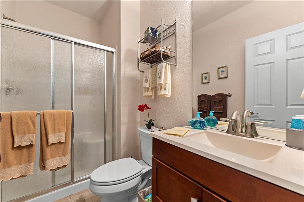 193 Lentz Road Latrobe, PA 15650 - Photo 35 of 45 a bathroom with a sink a toilet a mirror and shower