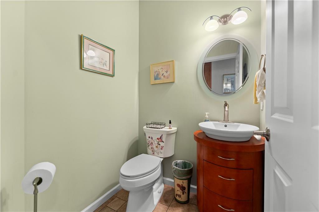 193 Lentz Road Latrobe, PA 15650 - Photo 37 of 45 a bathroom with a toilet sink and mirror