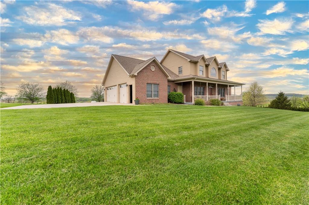 193 Lentz Road Latrobe, PA 15650 - Photo 4 of 45 a view of a house with a big yard and large trees