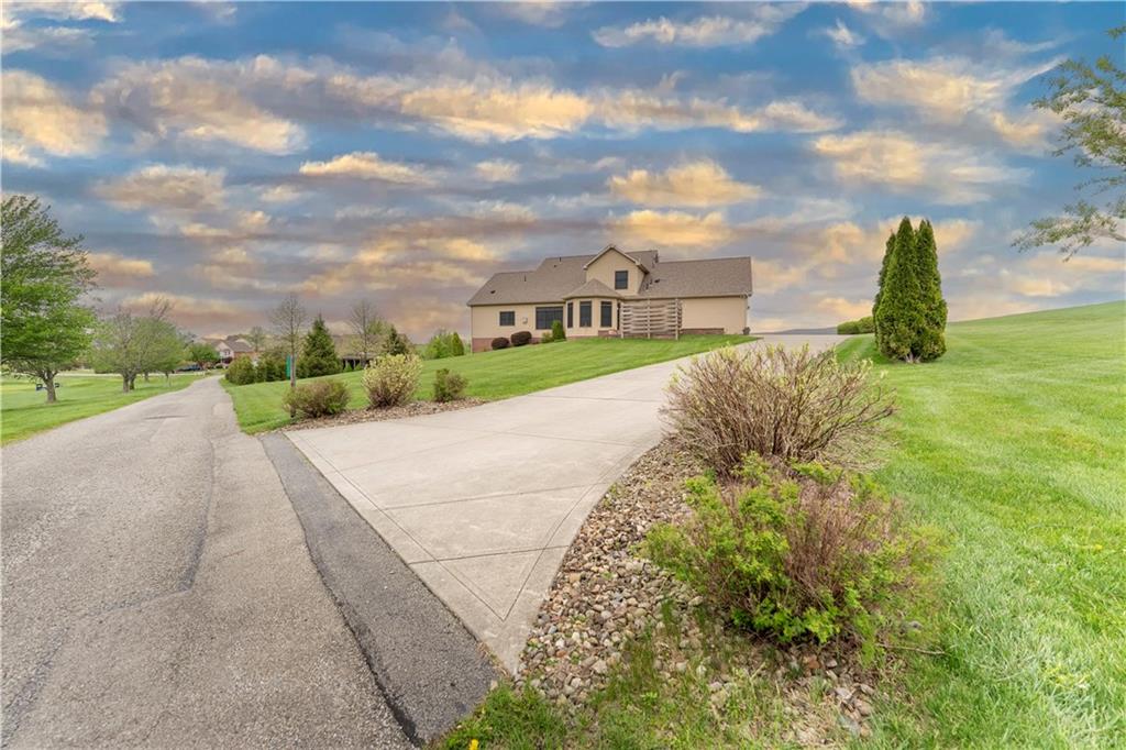 193 Lentz Road Latrobe, PA 15650 - Photo 42 of 45 a view of a garden with a building in the background