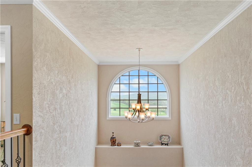 193 Lentz Road Latrobe, PA 15650 - Photo 6 of 45 a view of an entryway with a chandelier